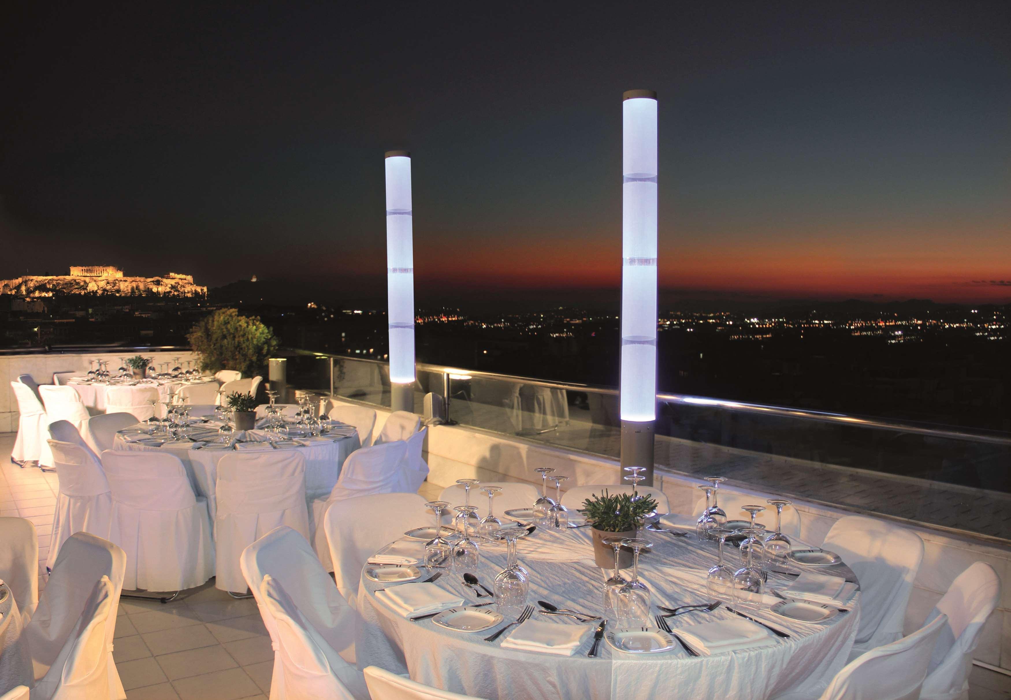 Radisson Blu Park Hotel Атина Екстериор снимка The Acropolis Museum at night