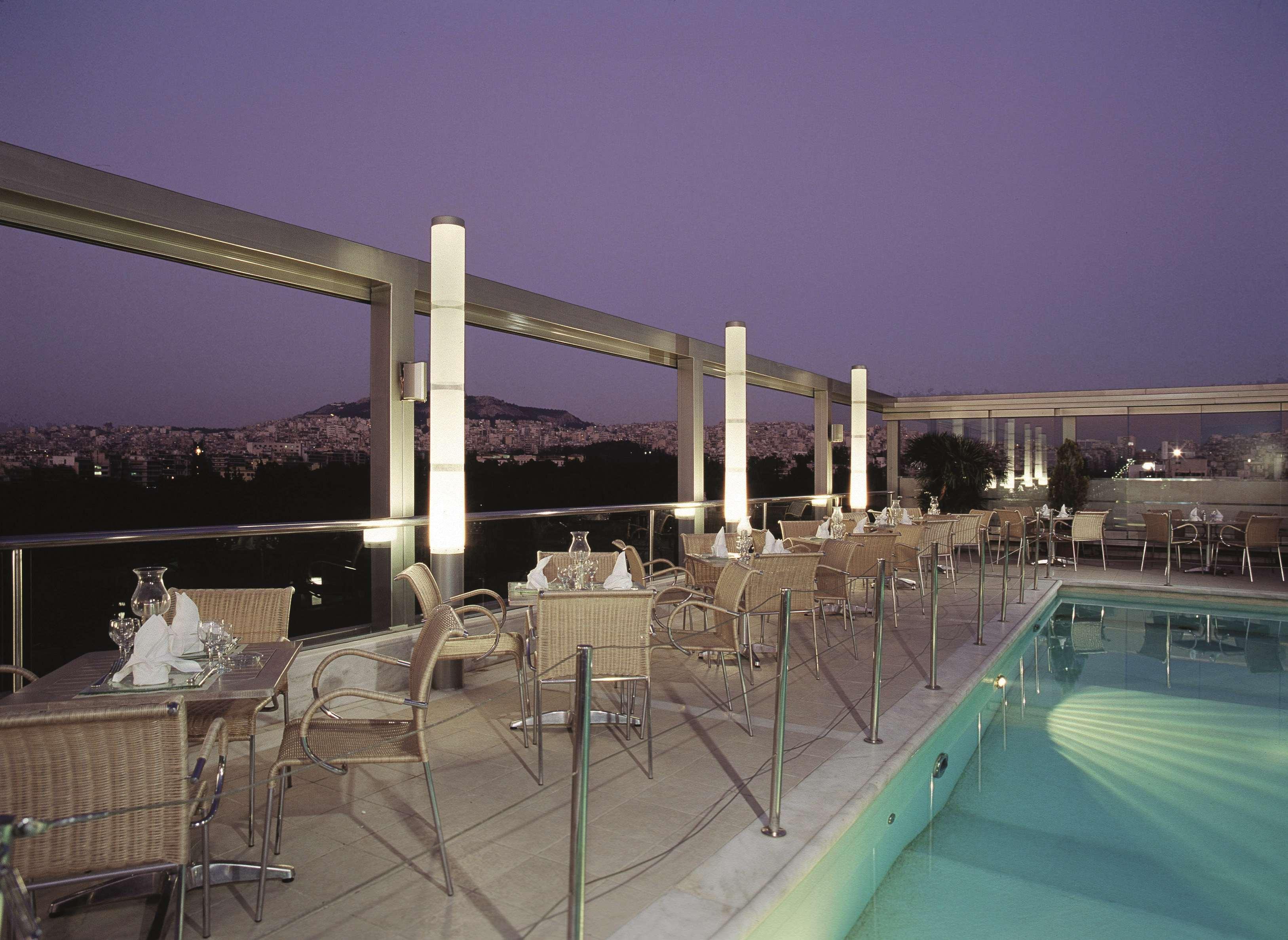 Radisson Blu Park Hotel Атина Екстериор снимка The pool at the hotel