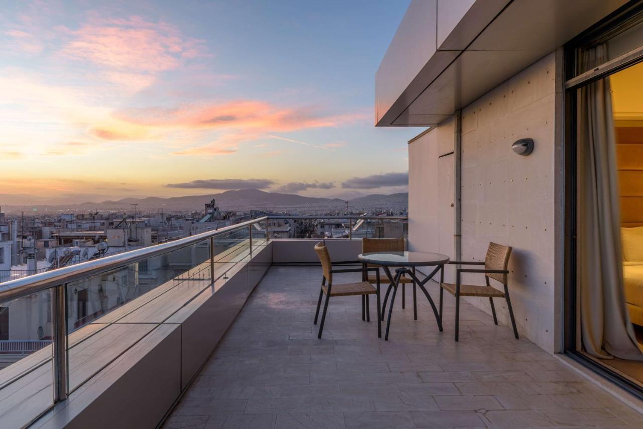 Radisson Blu Park Hotel Атина Екстериор снимка A balcony in Athens, Greece