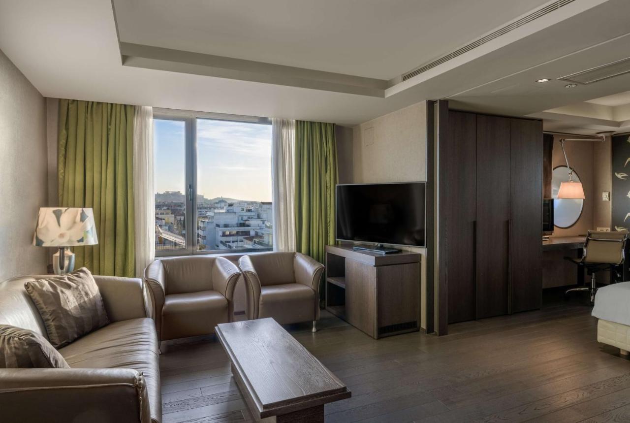 Radisson Blu Park Hotel Атина Екстериор снимка A suite at the hotel