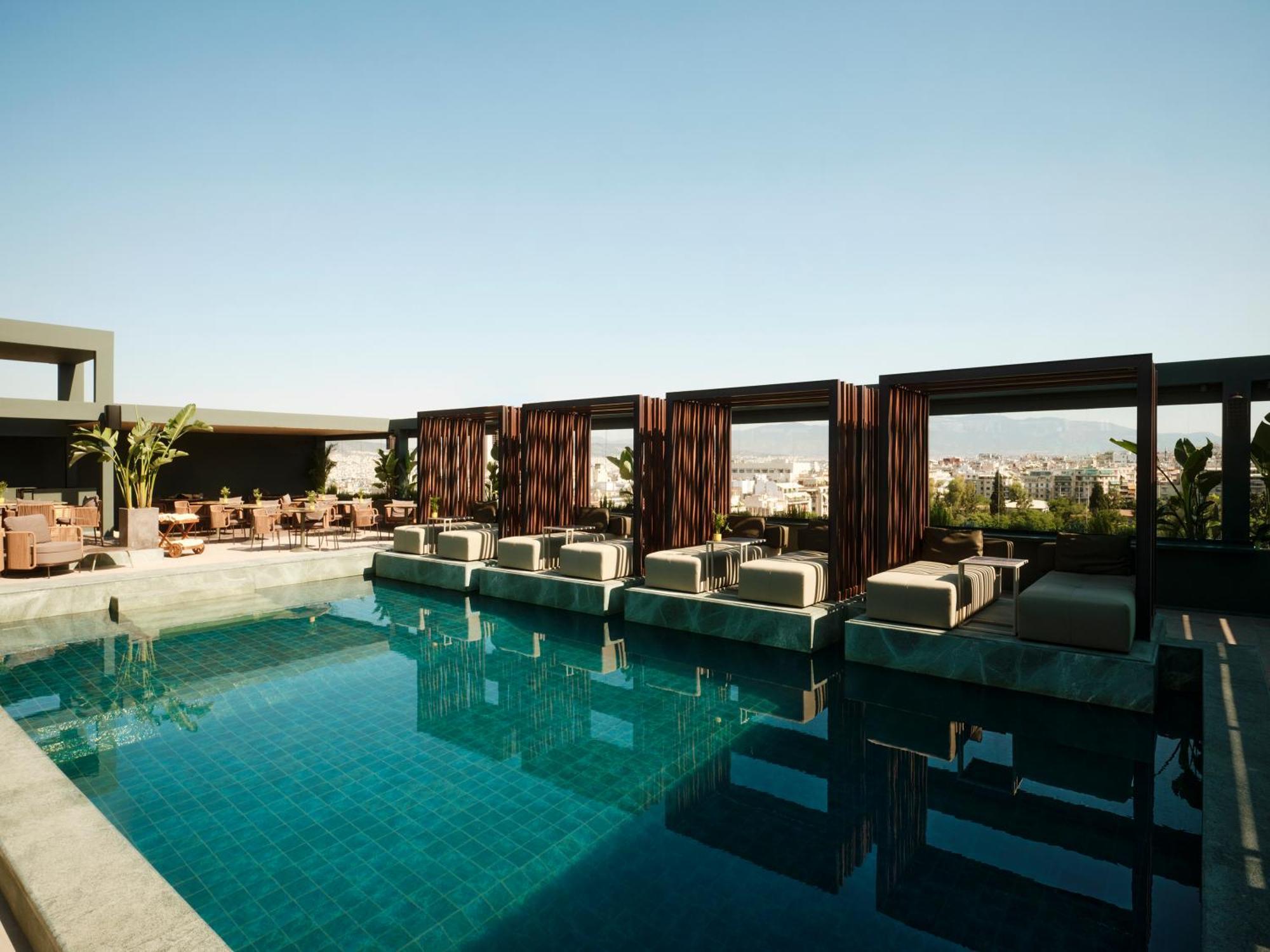 Radisson Blu Park Hotel Атина Екстериор снимка The pool at the hotel